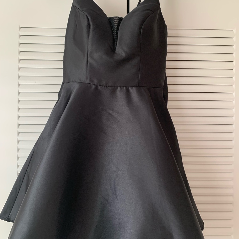 Black mini dress skinny strap mesh detail